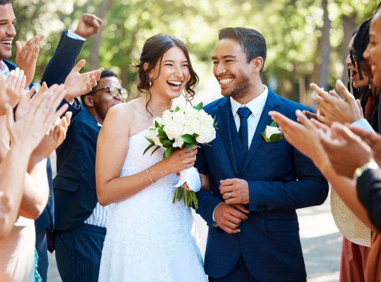 A couple is smiling together.